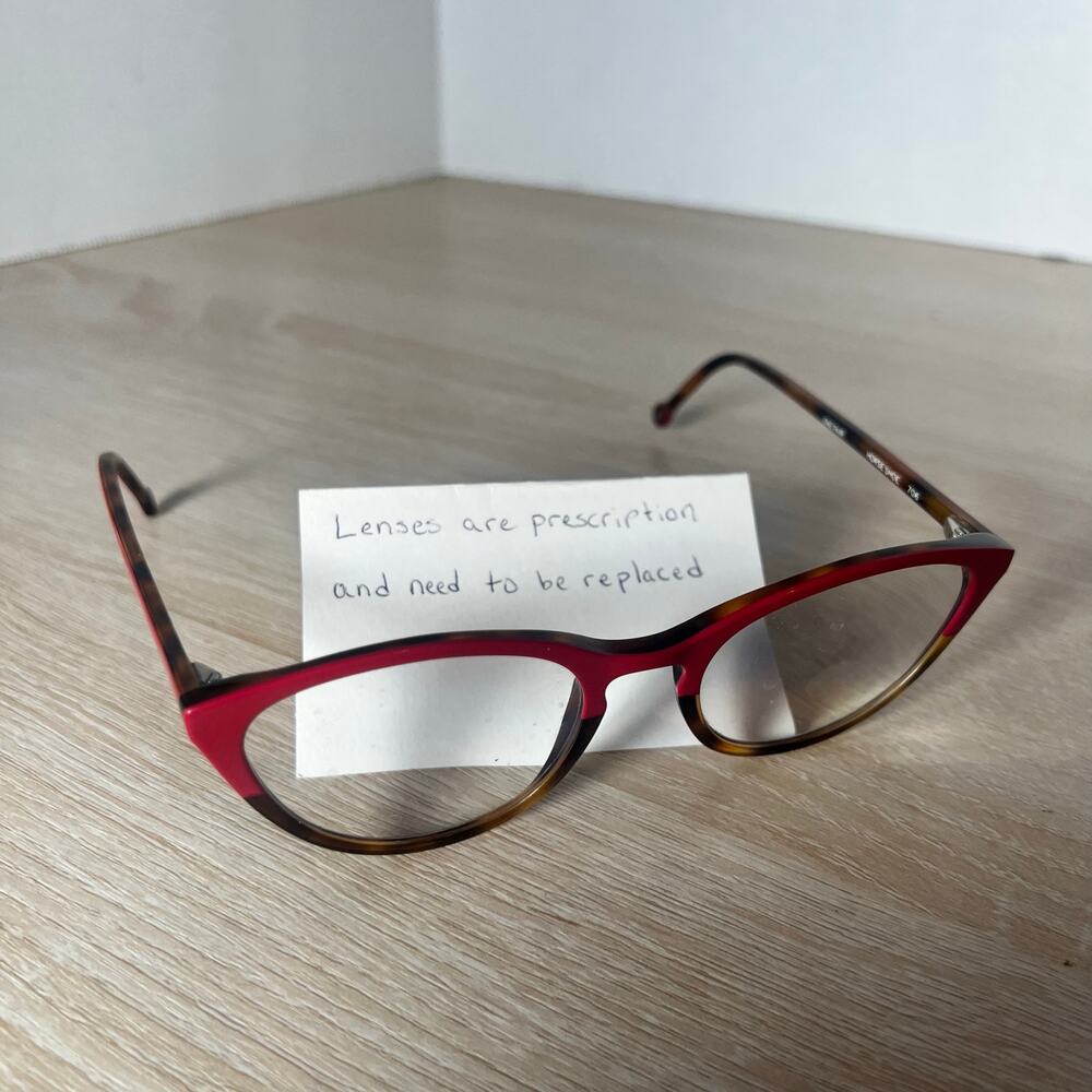L.A. Eyeworks Horse Shoe 706 Eyeglasses Red Tortoise Shell Cat Eye 52-21-140